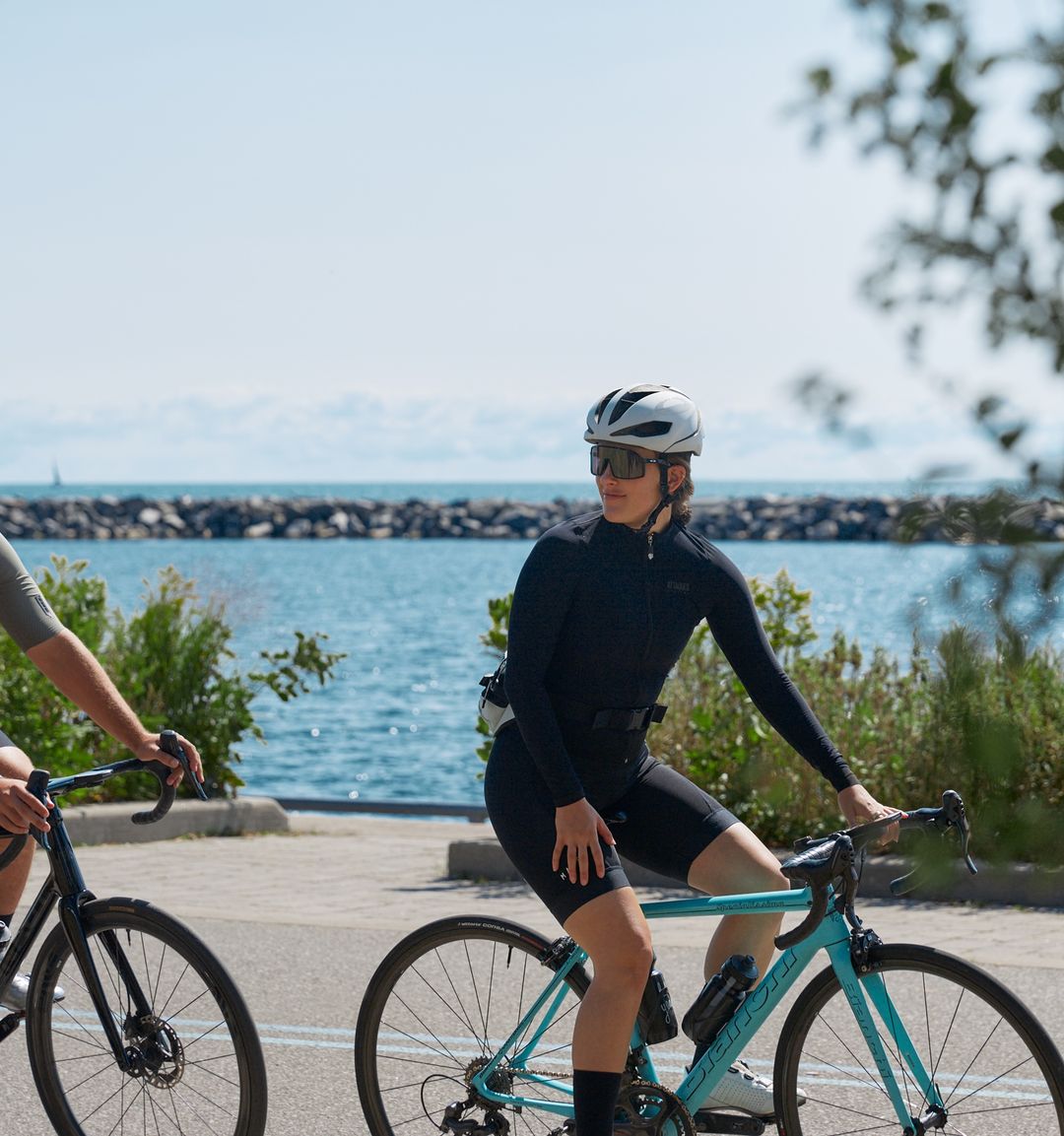 Cyclists beside the Lake Ontario waterfront